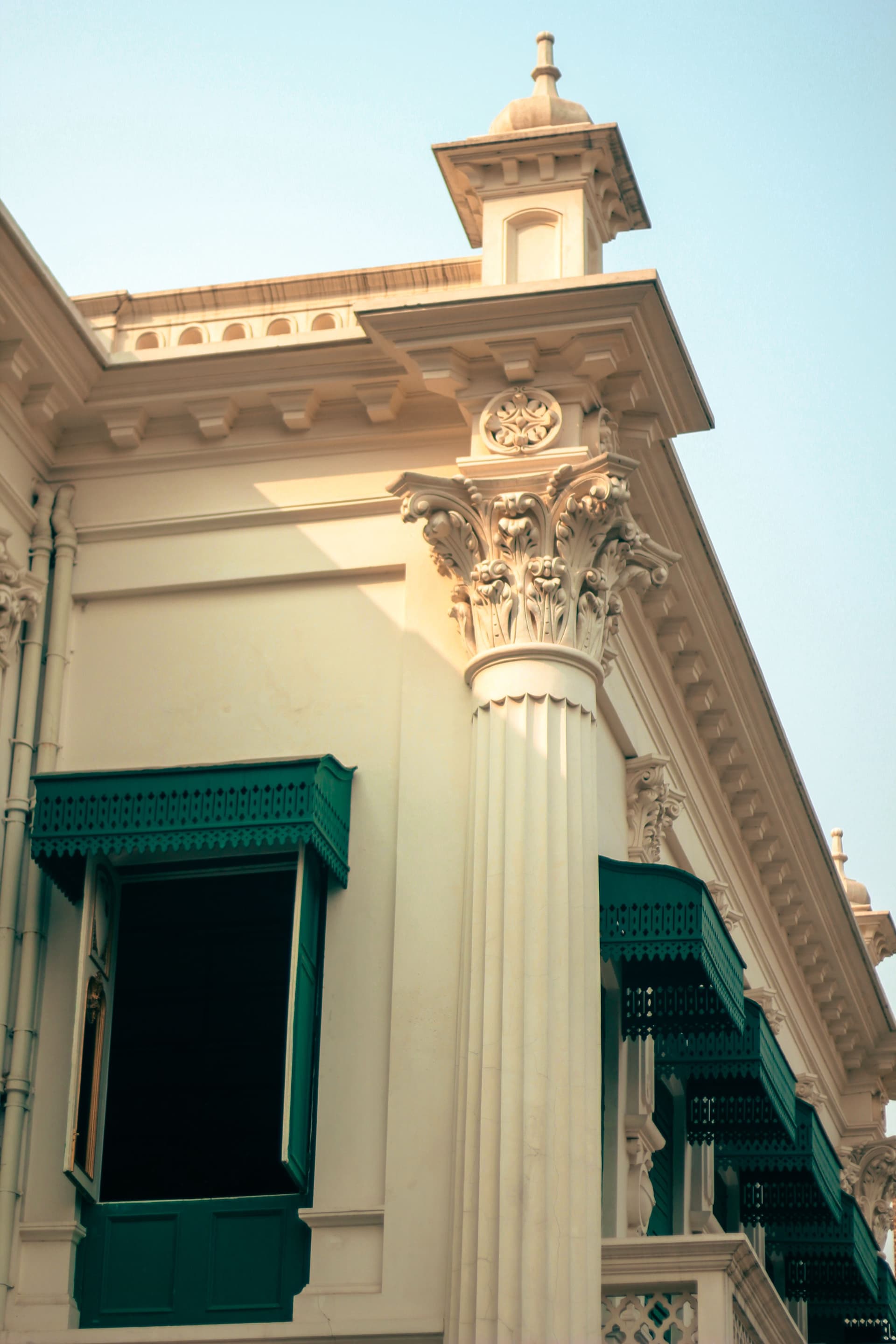 Classical architectural details illuminated by sunlight in Dhaka